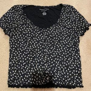 Black tshirt with white flowers